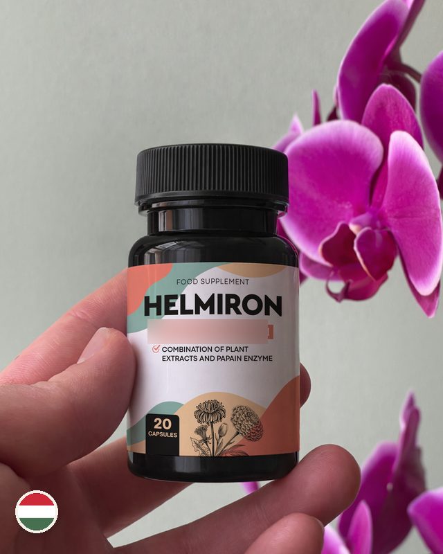 Helmiron flakon kézben, orchidea mellett, címke a névvel és növényrajzzal